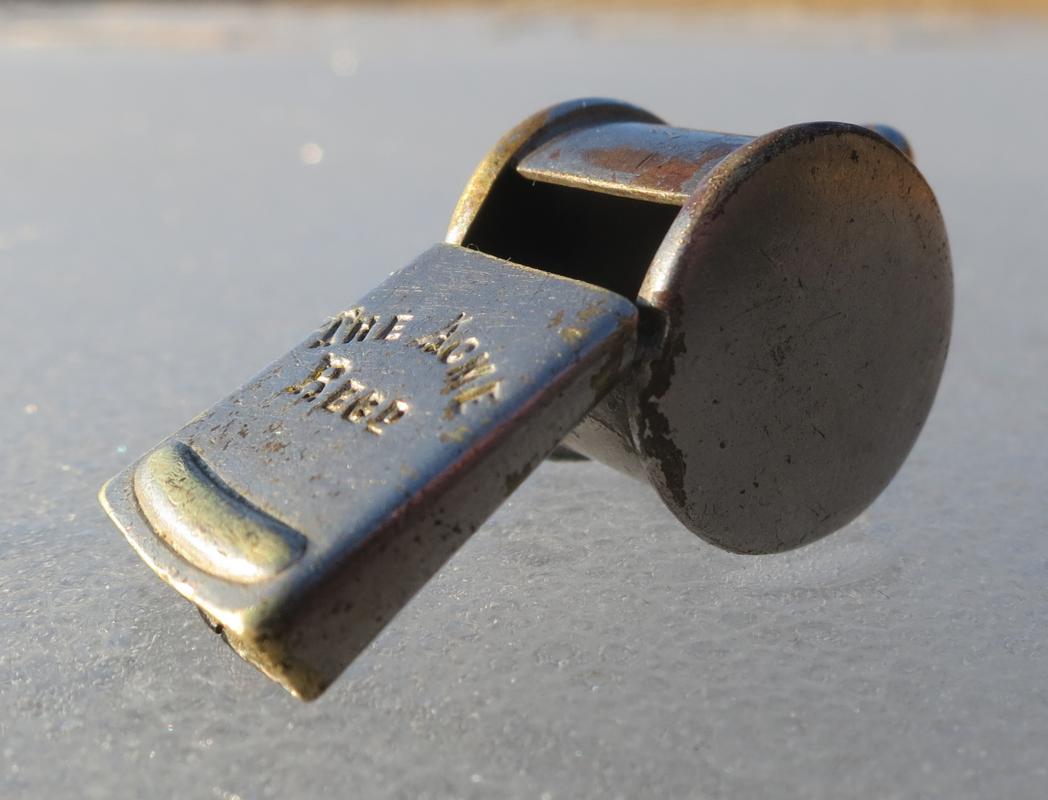 A brass Acme Thunderer whistle made by J. Hudson & Co, the British firm that popularised the modern police and referee whistle in the late 19th century.